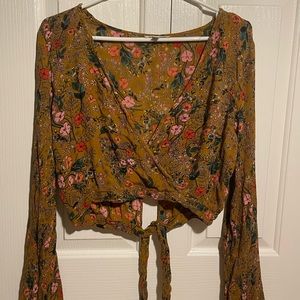 Lovely cross front blouse, Slightly cropped with a tie back and cuffed sleeves
